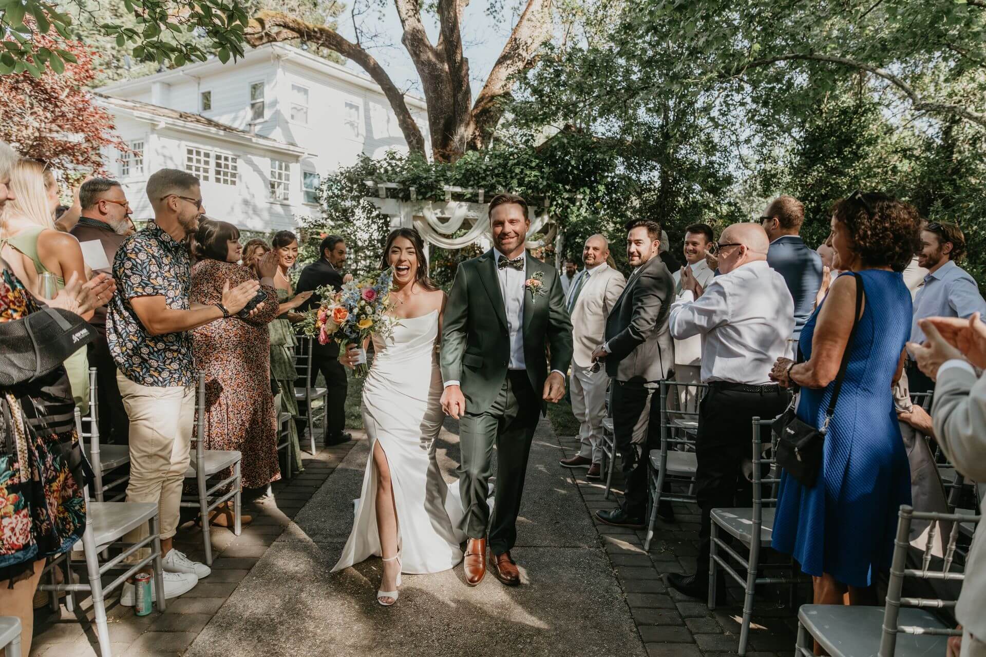 Newlyweds walking down the aisle at a wedding